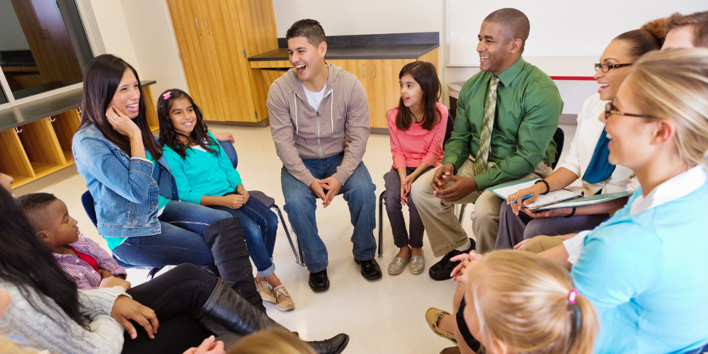 circle of students with teacher