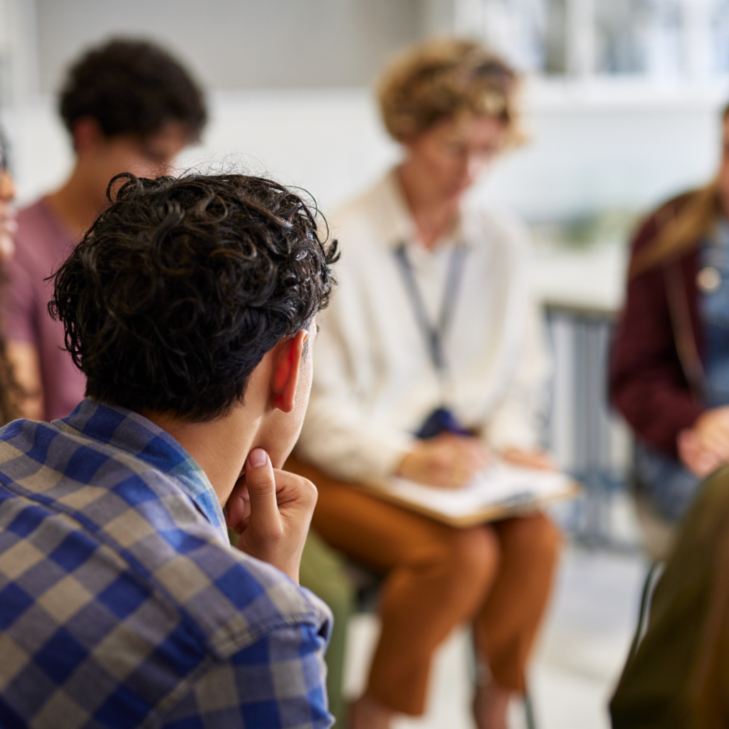 on-site visit days for school - student listening to a session